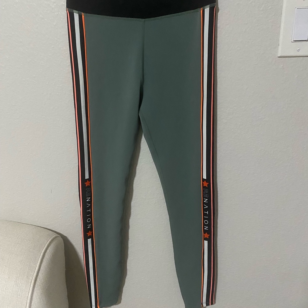 P.E Nation Olive Green Kids Leggings with Black & Orange Side Stripes